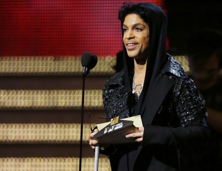 Image: Presenter Prince speaks on stage at the 55th annual Grammy Awards in Los Angeles